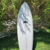“Classic twin-fin fish with glassed-on keel fins and a deep swallow